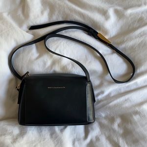 Want Les Essentiels black crossbody bag